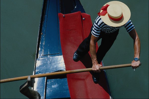769088 Gondolier On A Venetian Canal, Venice, Italy A4 Photo Print