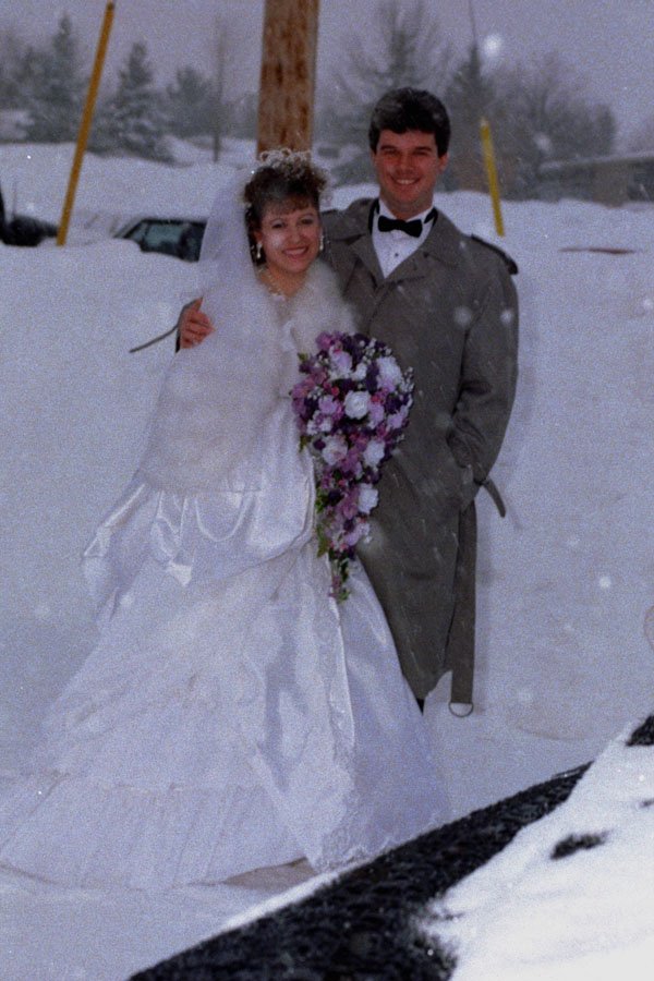 769093 Bride And Groom Standing In A Snow Storm A4 Photo Print