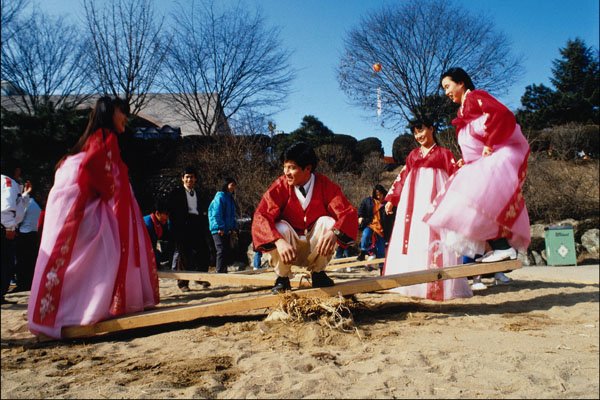 772047 Korean Seesawing A4 Photo Print
