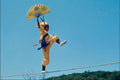 772068 Walking On The Tightrope A4 Photo Print