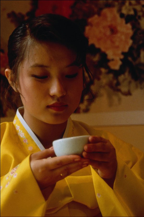 772073 A Woman Having Tea A4 Photo Print