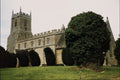 777050 Church In Small English Village A4 Photo Print
