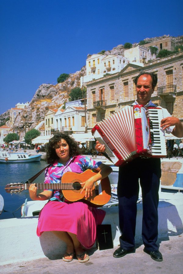 782000 Musicians, Symi, Greece A4 Photo Print