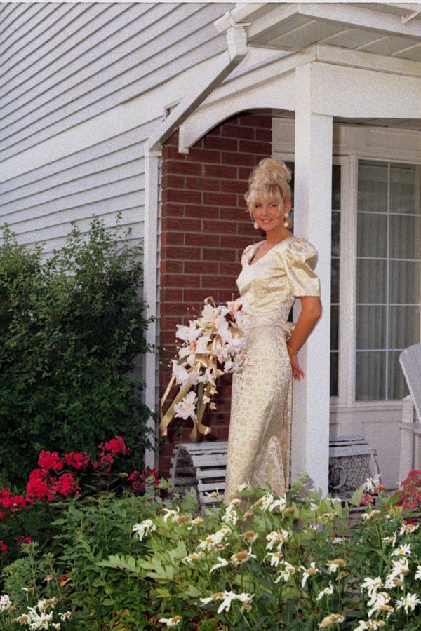 782012 Bride In Front Of House A4 Photo Print