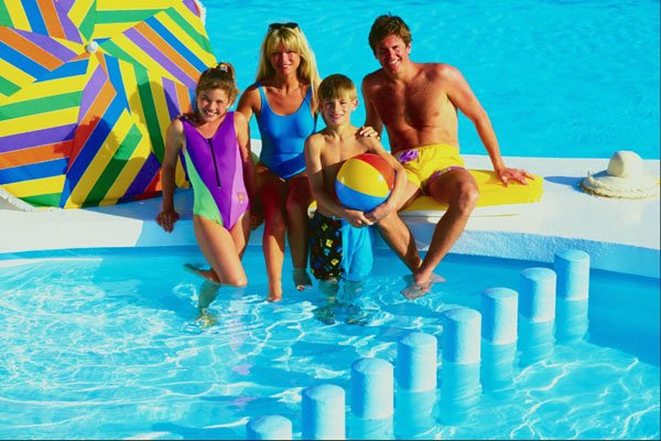 782099 Family Sitting On Poolside, Lanzarote, Spain A4 Photo Print