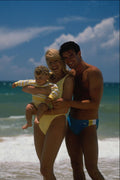 783038 Couple On Beach, With Baby A4 Photo Print