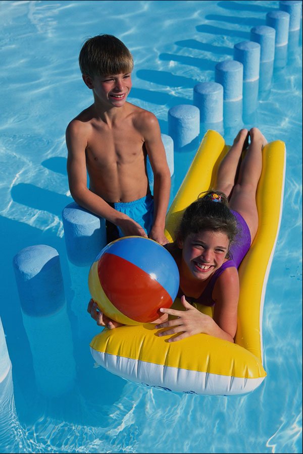 783091 Boy And Girl With Mattress, In Pool A4 Photo Print