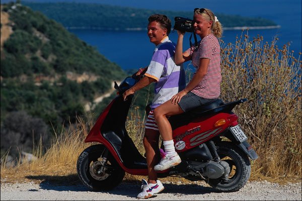 784023 Couple On Moped, Levas, Greece A4 Photo Print