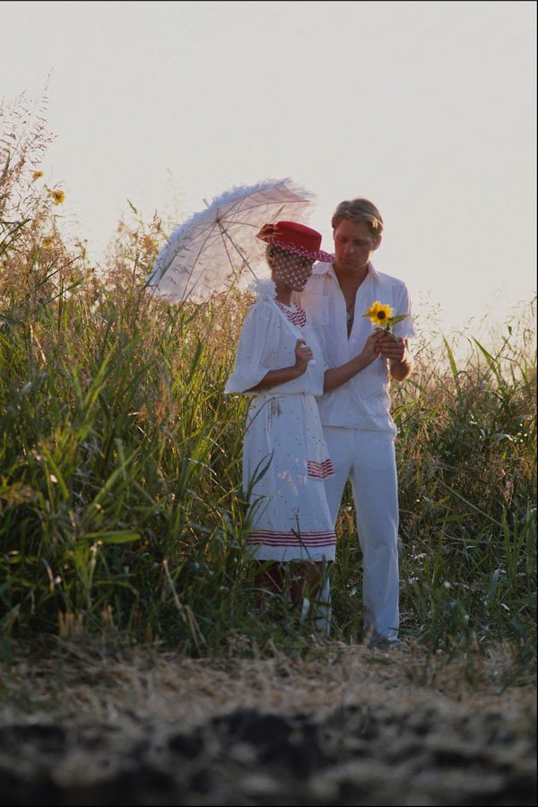 784055 Couple Walking In Tall Grass A4 Photo Print