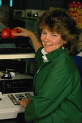 784056 Young Woman At Supermarket Checkout A4 Photo Print