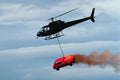 786053 Helicopter Transporting Burning Vehicle A4 Photo Print