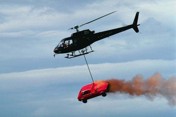 786053 Helicopter Transporting Burning Vehicle A4 Photo Print