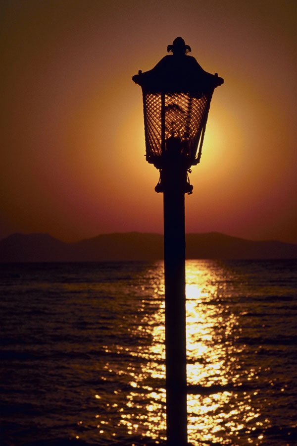 790025 A Candelabrum Backed By A Sunset, Aegean Sea, Turkey A4 Photo Print