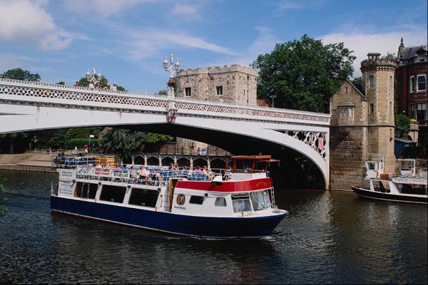 792040 Cruiser Passing Under, Lendal Bridge, York, U.K. A4 Photo Print