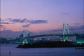 792097 Rainbow Bridge Crossing Tokyo Bay, Japan A4 Photo Print