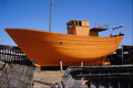794006 Boat Building On The Coast A4 Photo Print