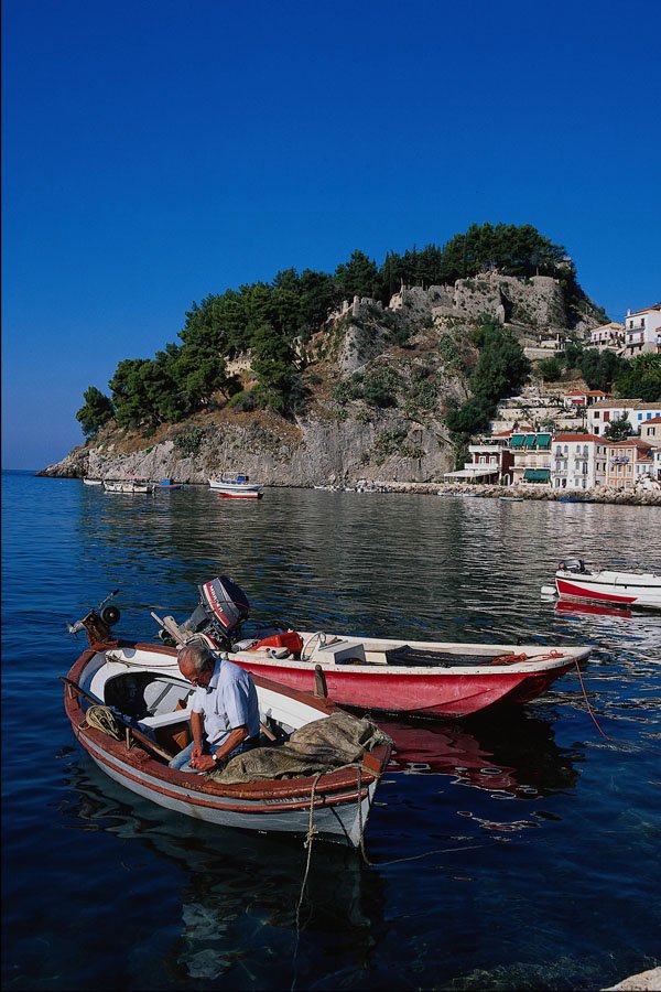 794043 Fisherman In Harbor, Parga, Greece A4 Photo Print