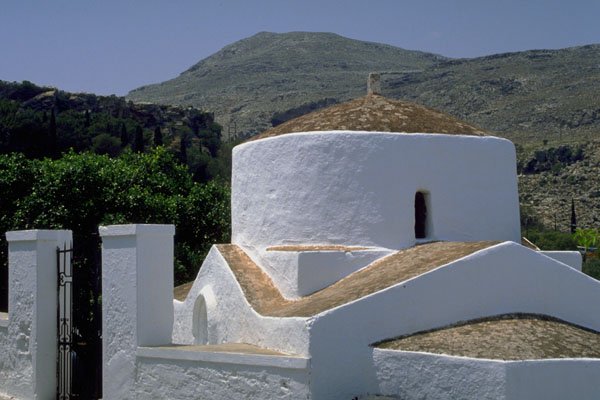 803070 Mountain And Whitewashed Building, Lindos, Rhodes, Greece A4 Photo Print