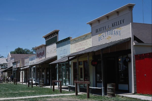 807008 Old Dodge City Storefronts In Dodge City, Kansas, U.S.A. A4 Photo Print