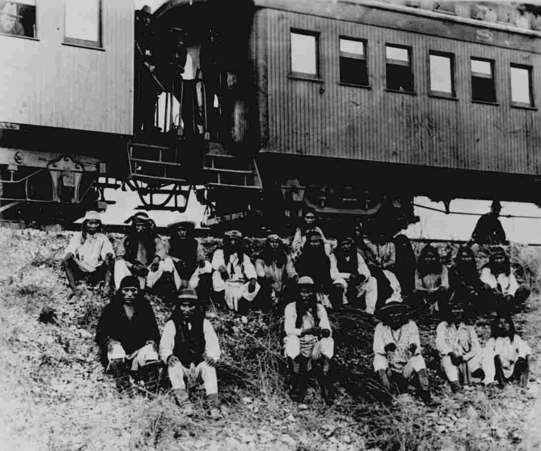 Band of Apache Indian prisoners at rest stop beside Southern Military A4 Photo Print