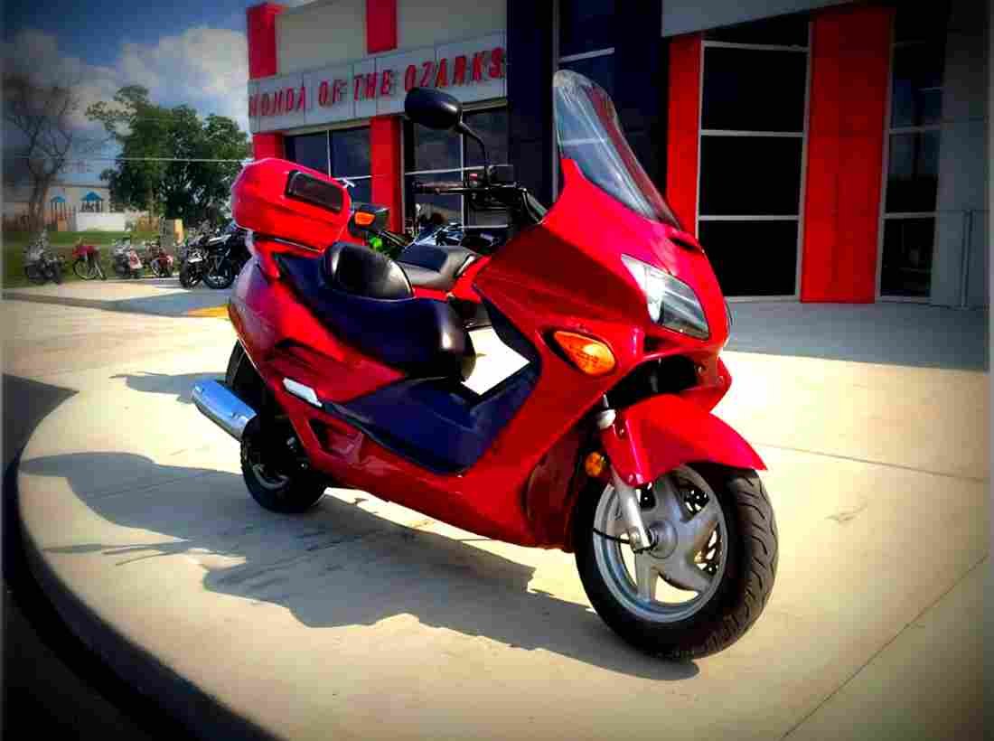 Honda NSS 250 Reflex 2002 1 motorbike A4 Photo Print