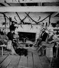 Interior of Sawtells Ranch Men gathered around fireplace Military A4 Photo Print