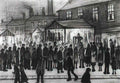L S Lowry outside the mill Art A4 Photo Print