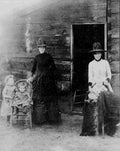 Mormons at Mormon Dairy Two women and their small children Military A4 Photo Print