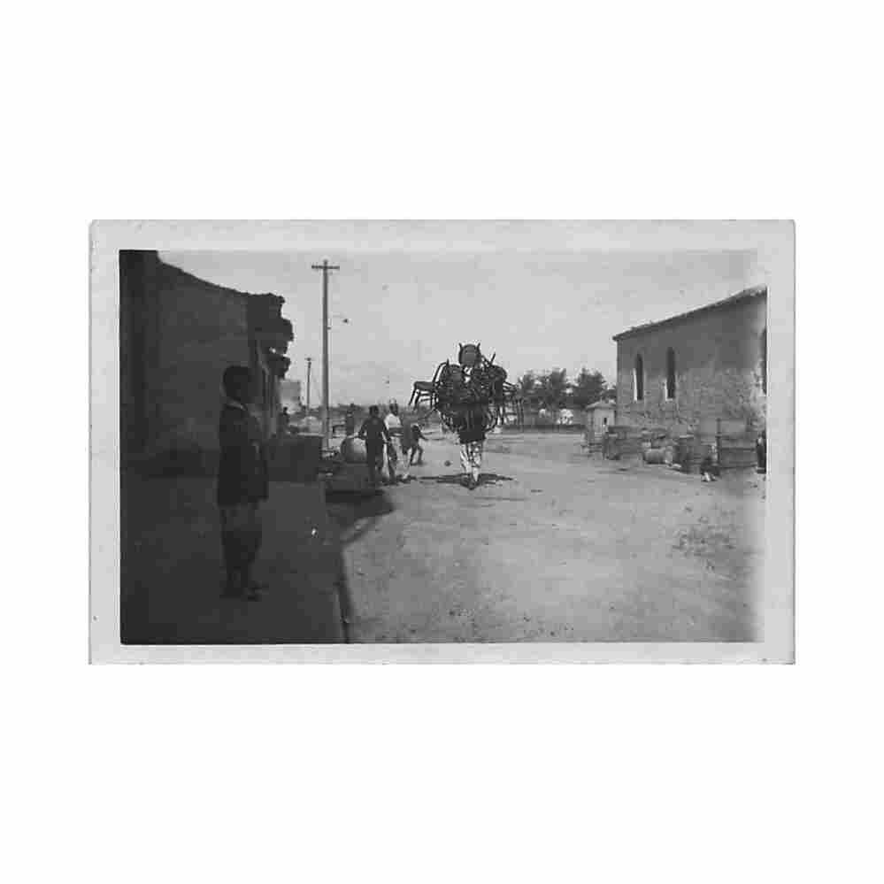 albania durres man carrying chairs Vintage A4 Photo Print