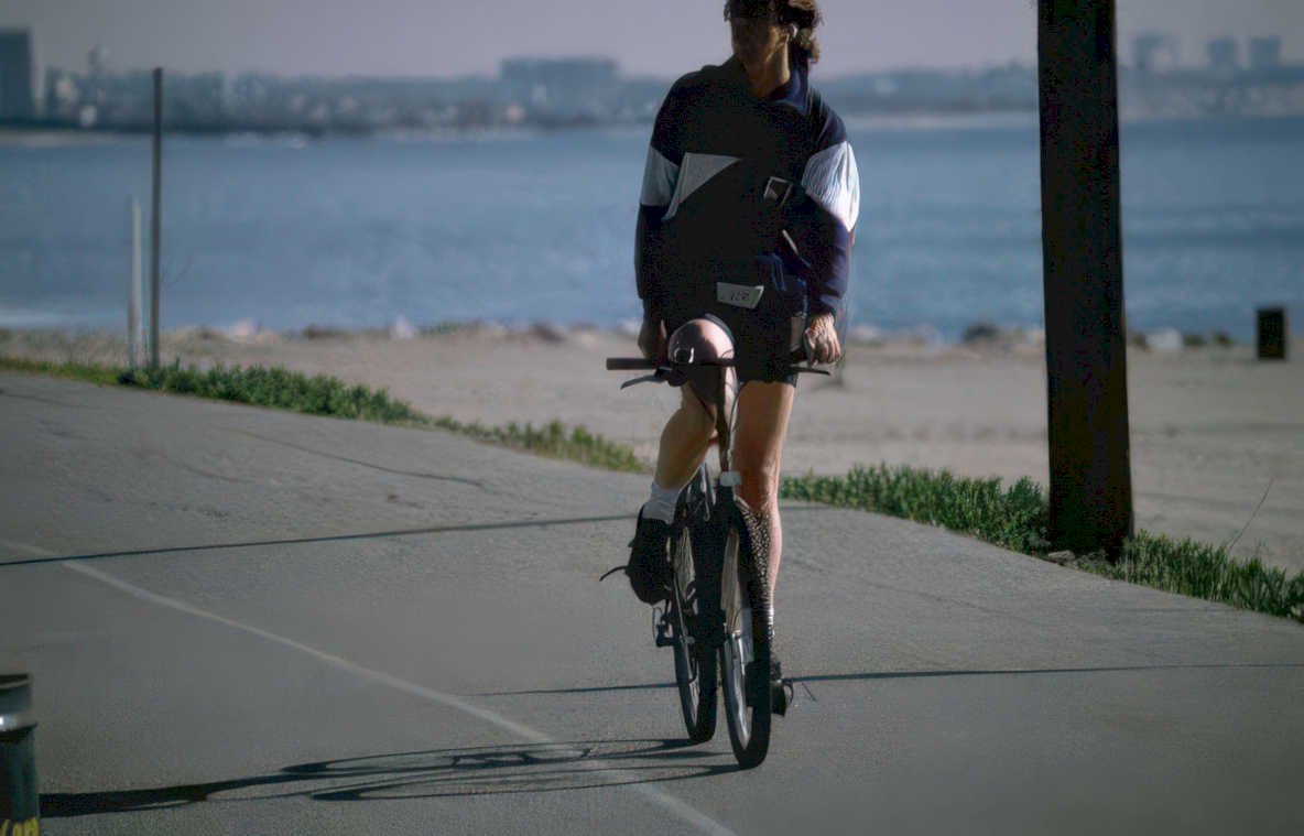 beachside cyclist 1980s Vintage A4 Photo Print