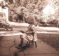 child reading sidewalk Vintage world war A4 Photo Print
