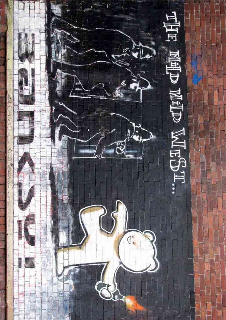 mild mild west banksy A4 Photo Print