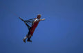 paragliding red jumpsuit Vintage A4 Photo Print