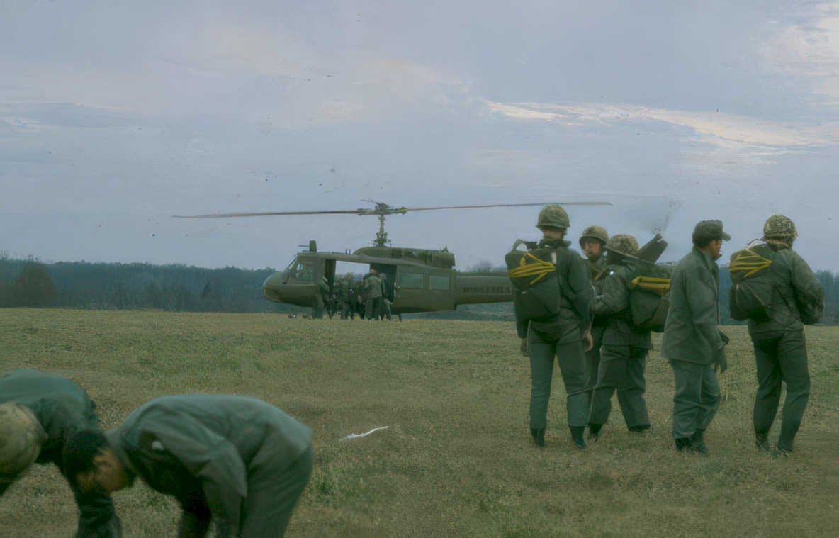 paratroopers landing huey Vintage A4 Photo Print