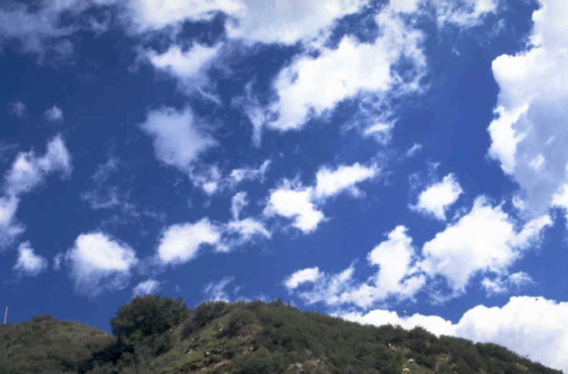 sky clouds hillside 1980s 1990s A4 Photo Print