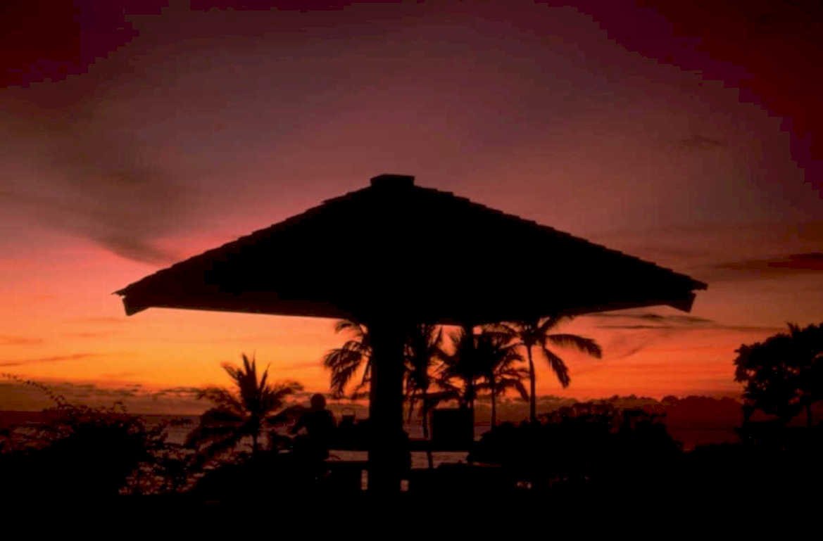 thatched pavilion sunset 1980s 1990s A4 Photo Print
